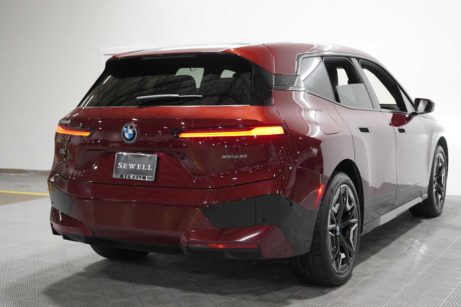 Certified Used 2024 Aventurin Red Metallic BMW xDrive50 image 4