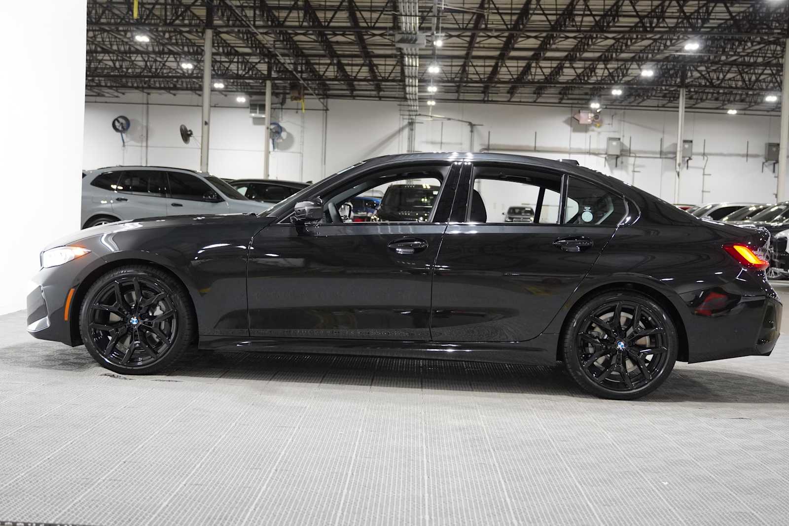 New 2026 Black Sapphire Metallic BMW 330i image 4