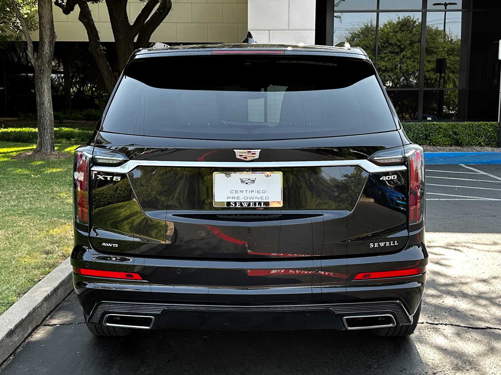 Certified Used 2025 Stellar Black Metallic Cadillac Sport image 3