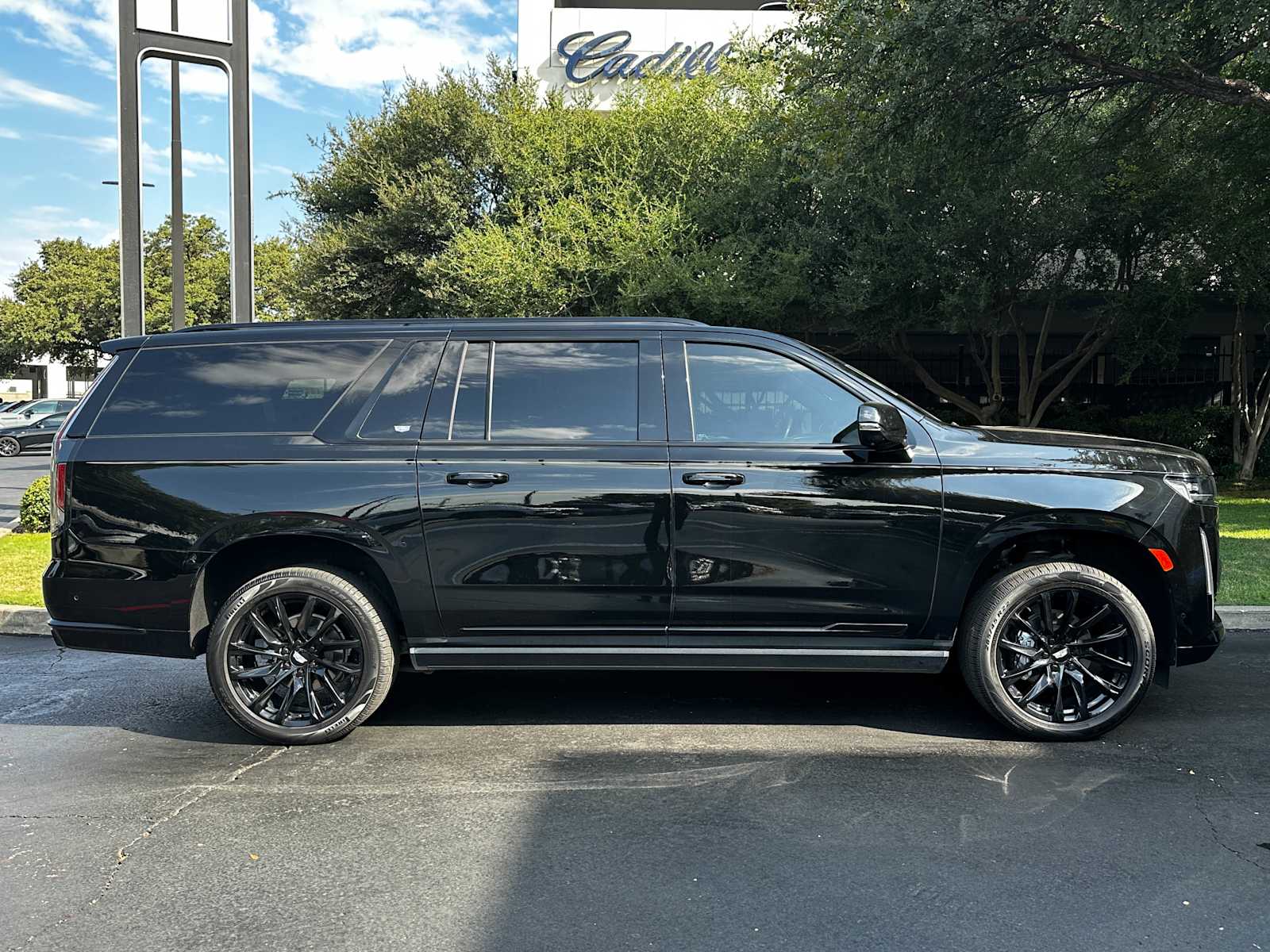 Used 2021 Black Raven Cadillac Sport image 6