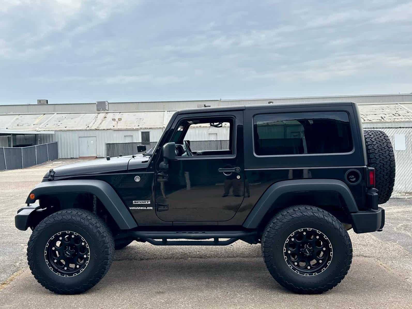 Used 2016 Black Clearcoat Jeep Sport image 2