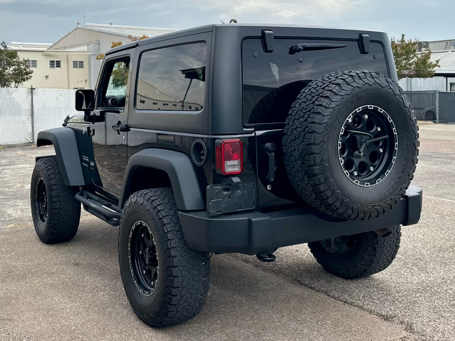 Used 2016 Black Clearcoat Jeep Sport image 4