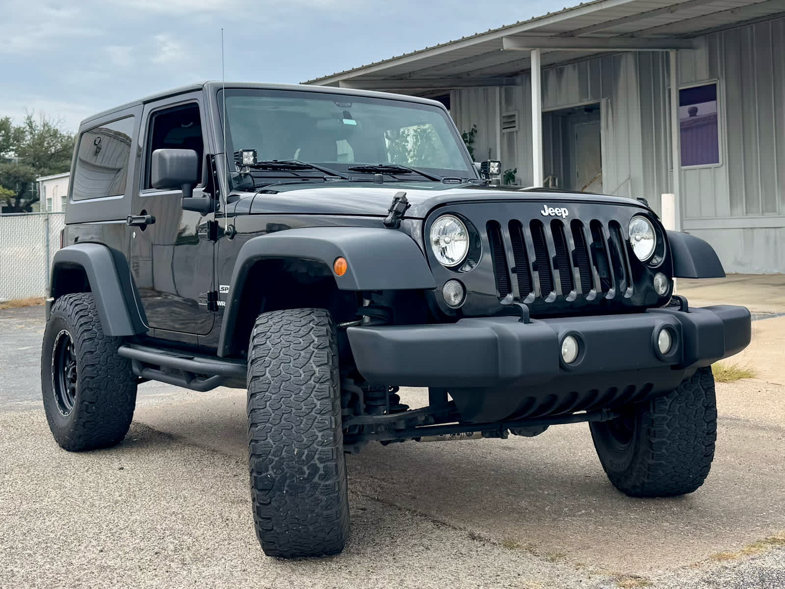 Used 2016 Black Clearcoat Jeep Sport image 8