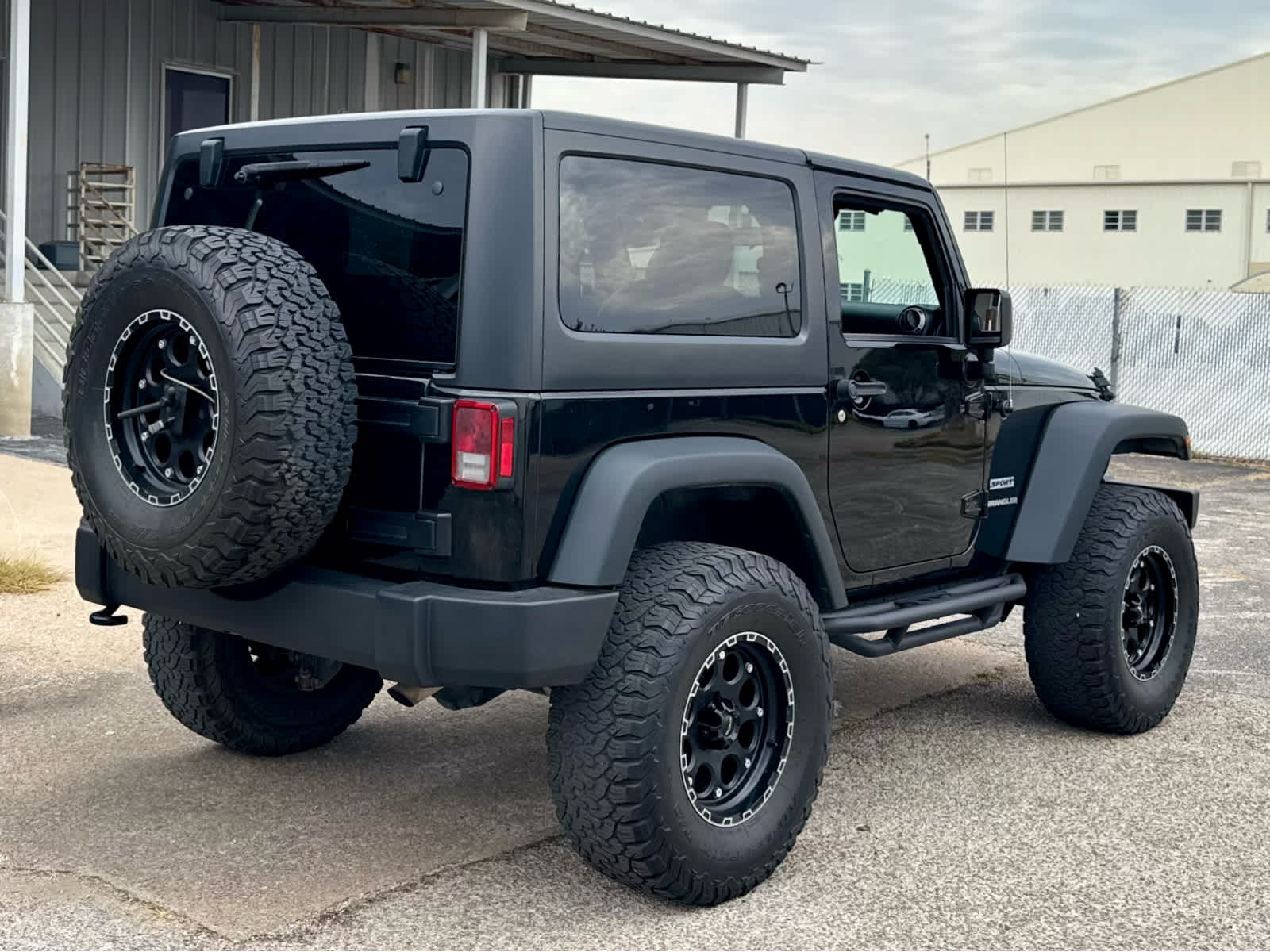 Used 2016 Black Clearcoat Jeep Sport image 6