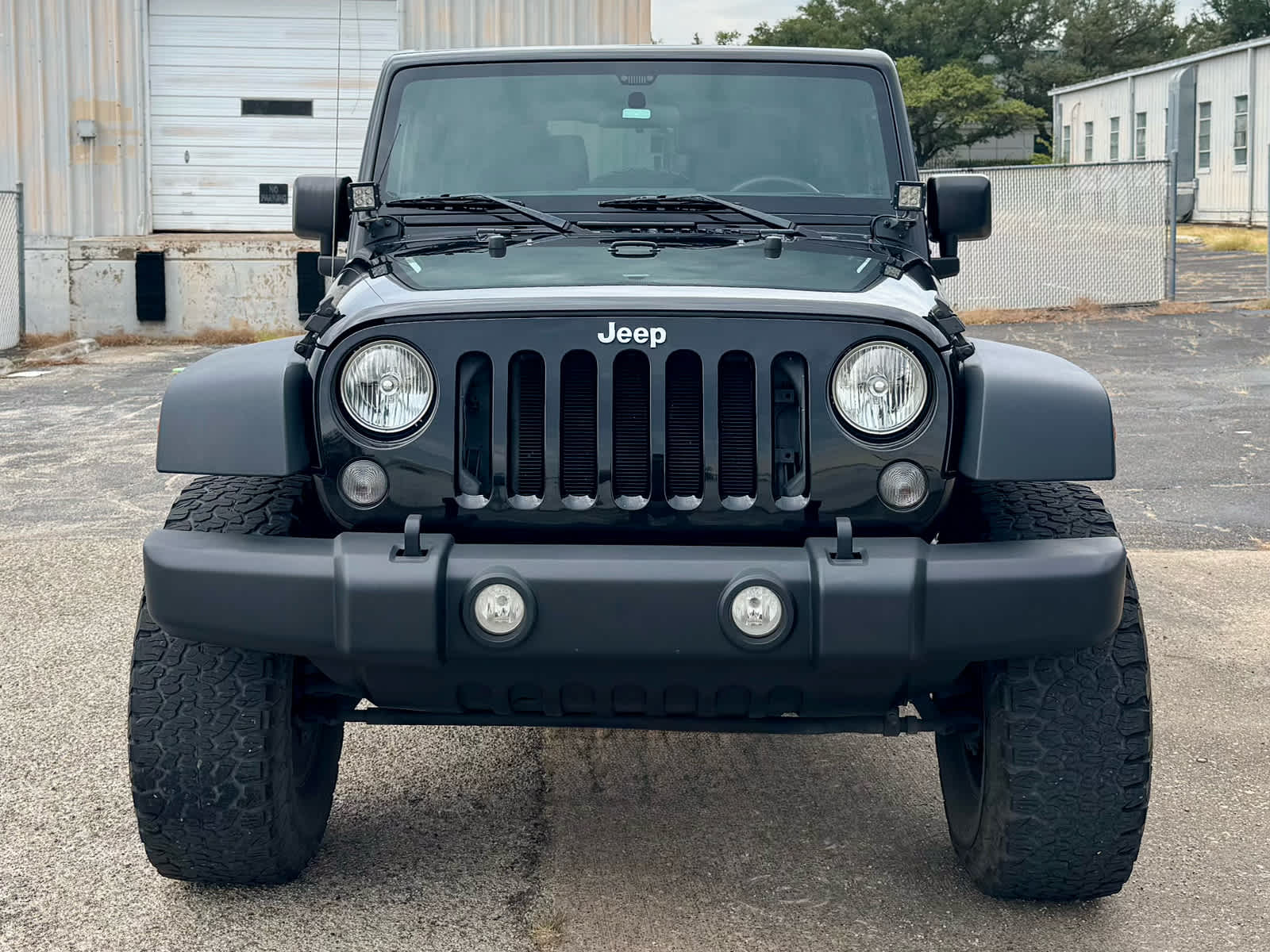 Used 2016 Black Clearcoat Jeep Sport image 9