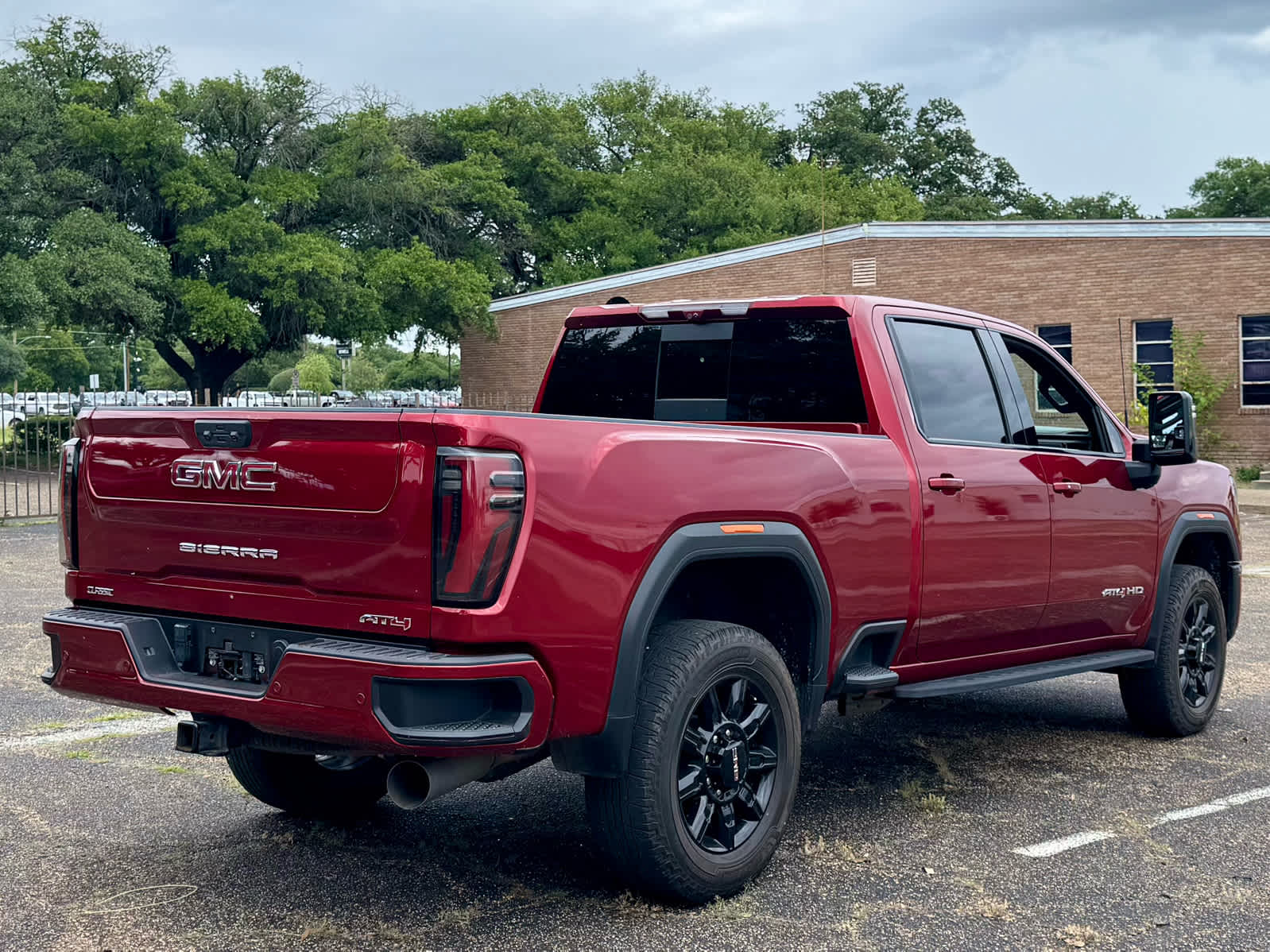 Used 2024 Volcanic Red Tintcoat GMC AT4 image 7