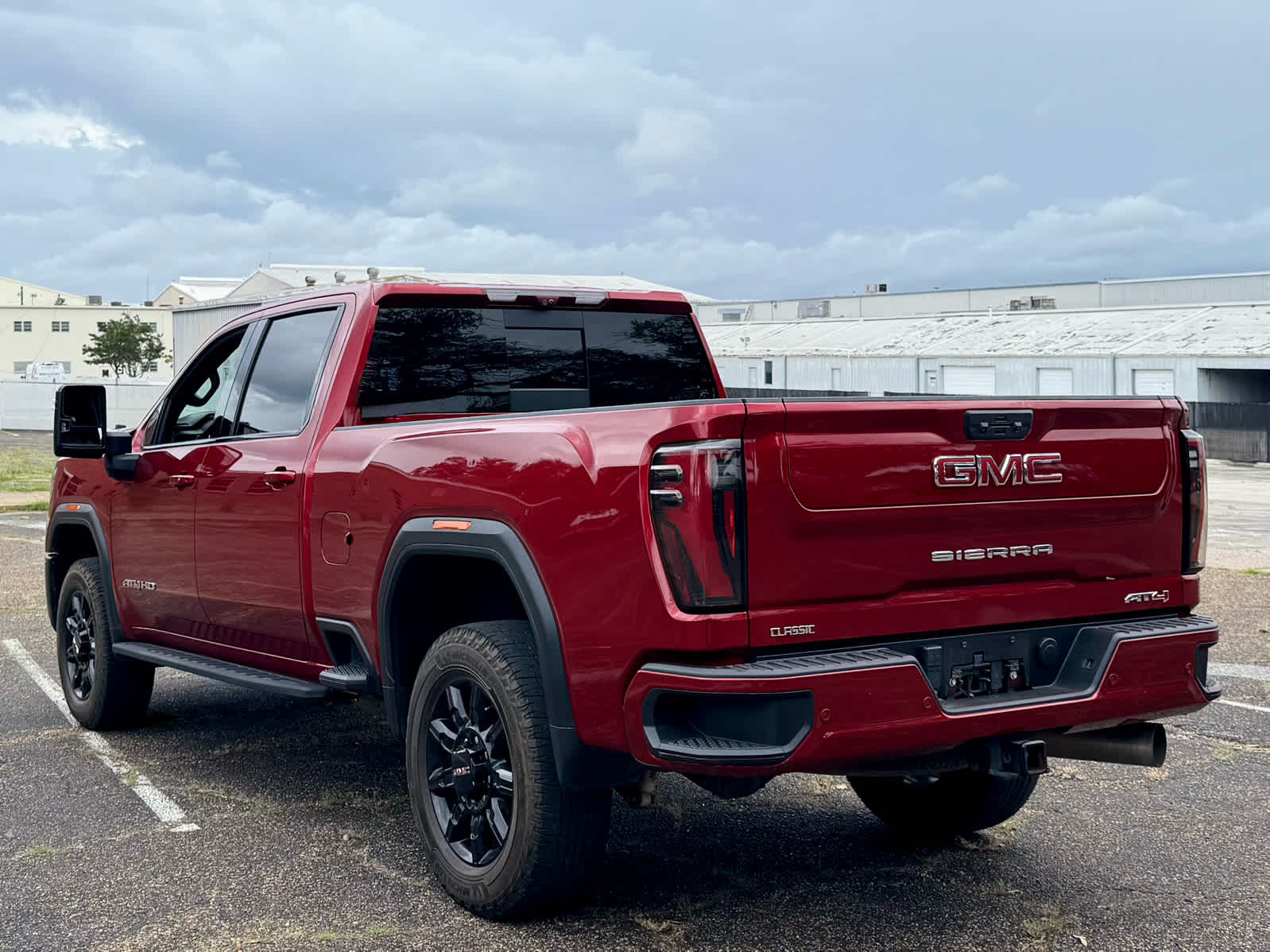Used 2024 Volcanic Red Tintcoat GMC AT4 image 4