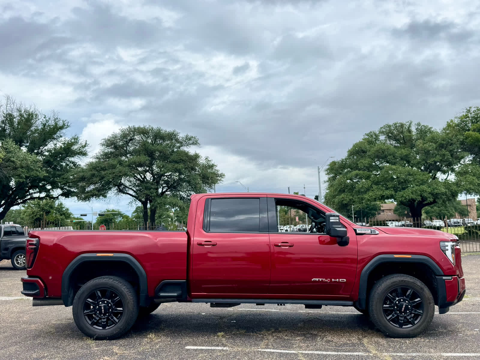 Used 2024 Volcanic Red Tintcoat GMC AT4 image 8
