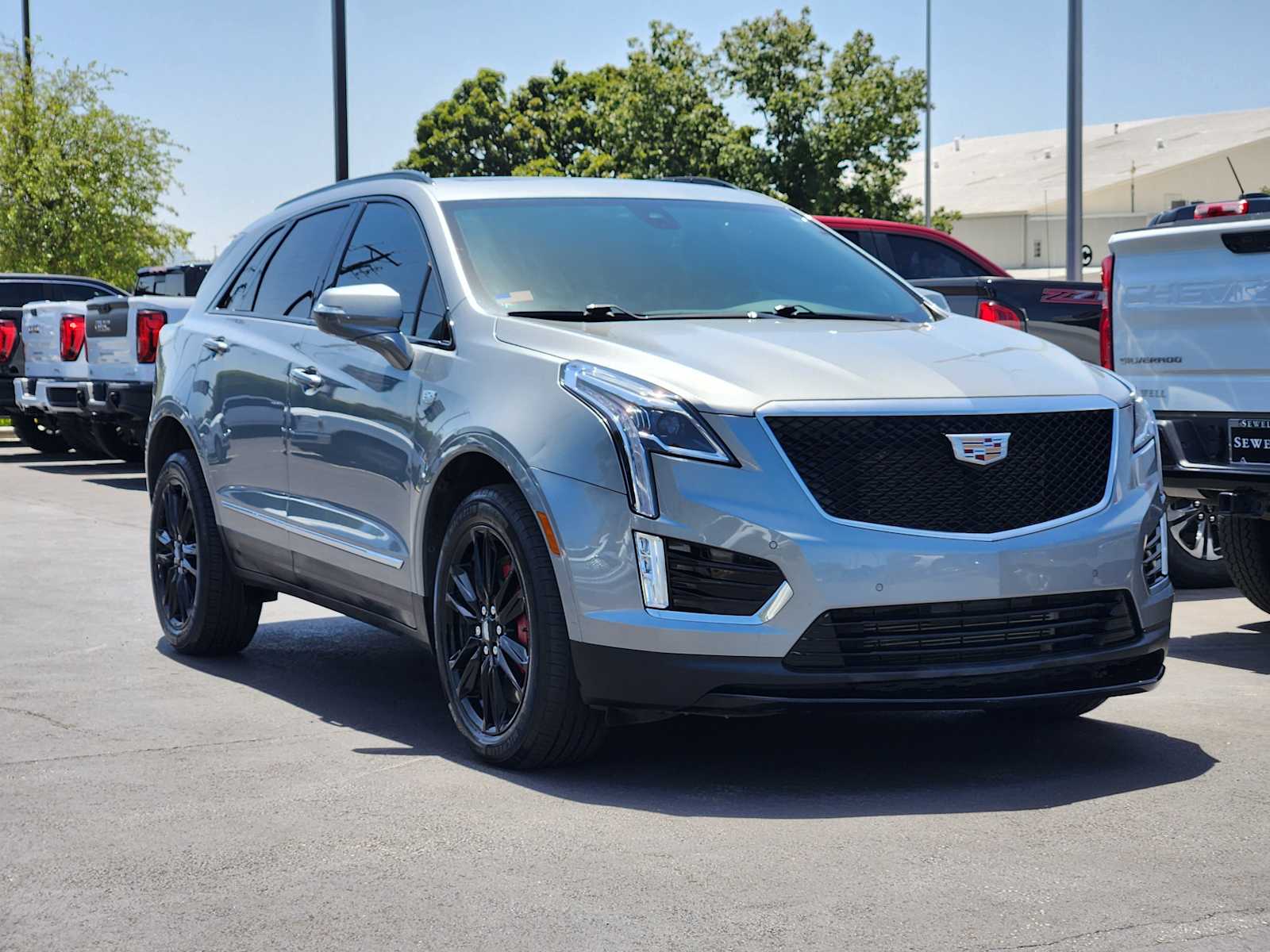 Used 2023 ARGENT SILVER METALLIC Cadillac AWD Sport image 3