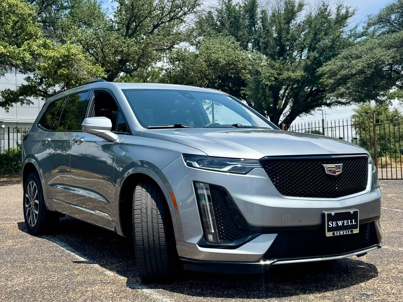 Used 2023 Argent Silver Metallic Cadillac AWD Sport image 9