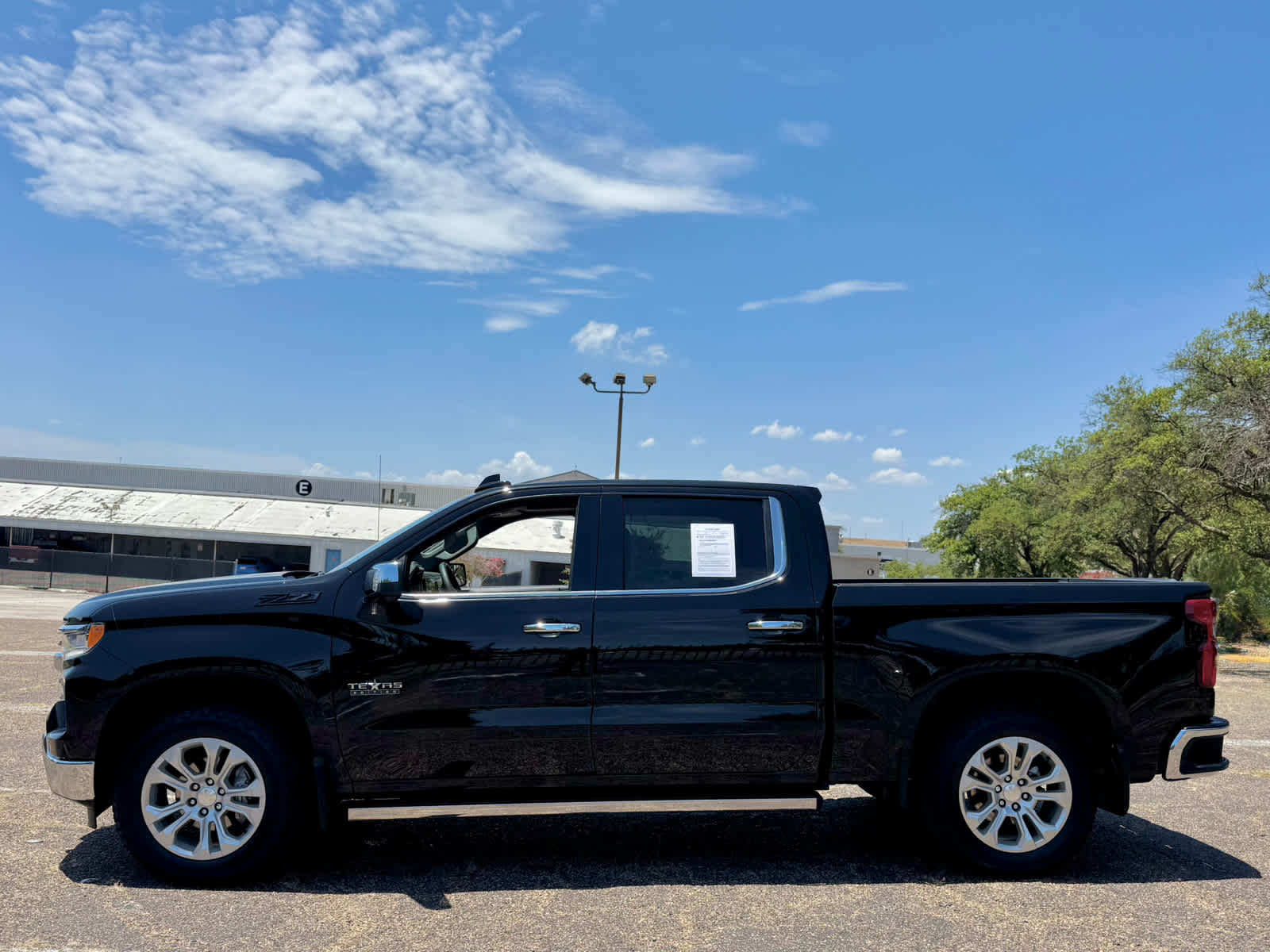 Certified Used 2025 Black Chevrolet LTZ image 2