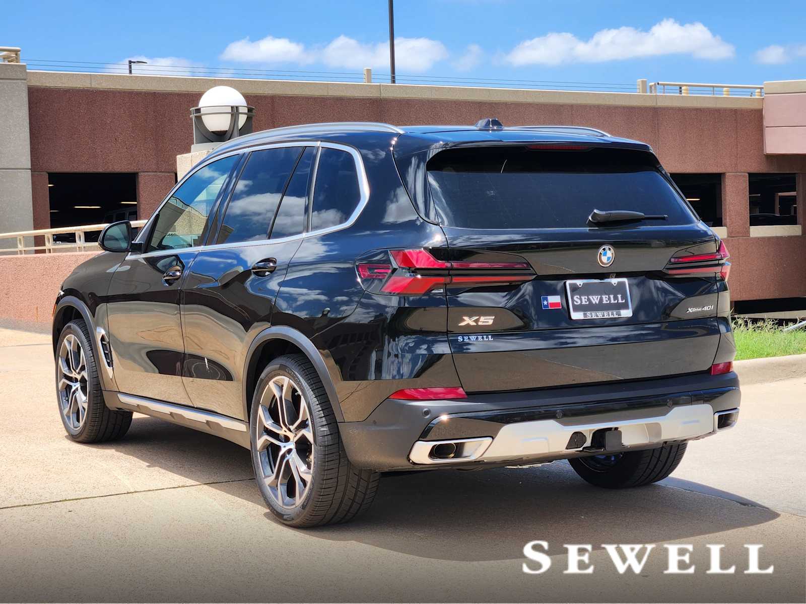 New 2026 Black Sapphire Metallic BMW xDrive40i image 3