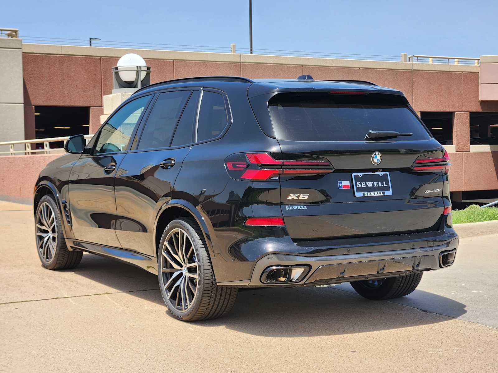 New 2026 Black Sapphire Metallic BMW xDrive40i image 3