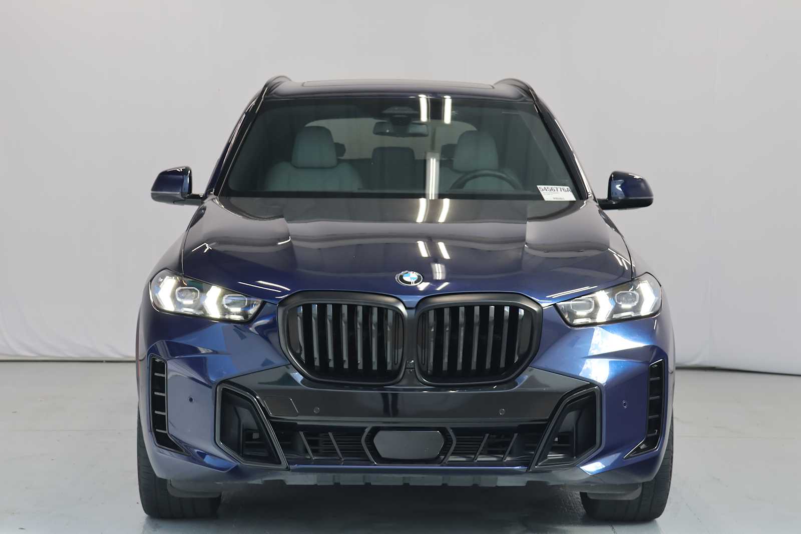 Certified Used 2024 Tanzanite Blue II Metallic BMW xDrive40i image 2