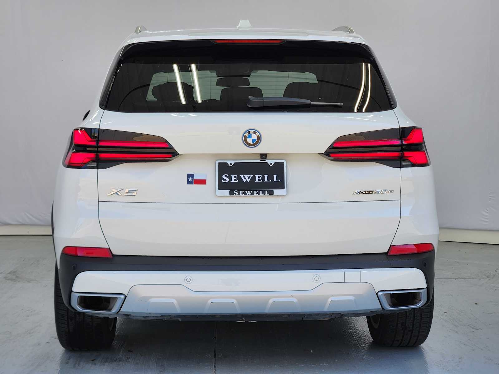 Certified Used 2025 Alpine White BMW xDrive50e image 7