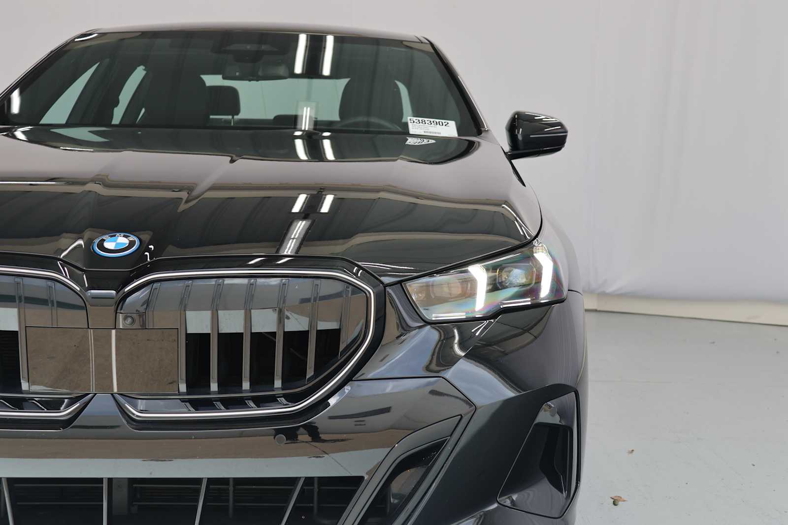 Certified Used 2026 Black Sapphire Metallic BMW 550e xDrive image 5