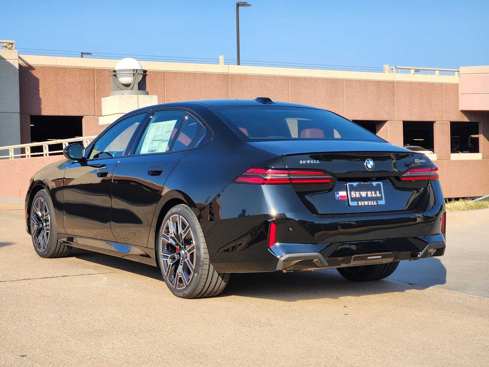 New 2027 Black Sapphire Metallic BMW 530i image 3