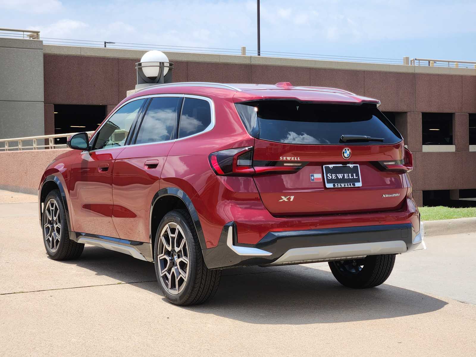 New 2026 Vegas Red Metallic BMW xDrive28i image 3