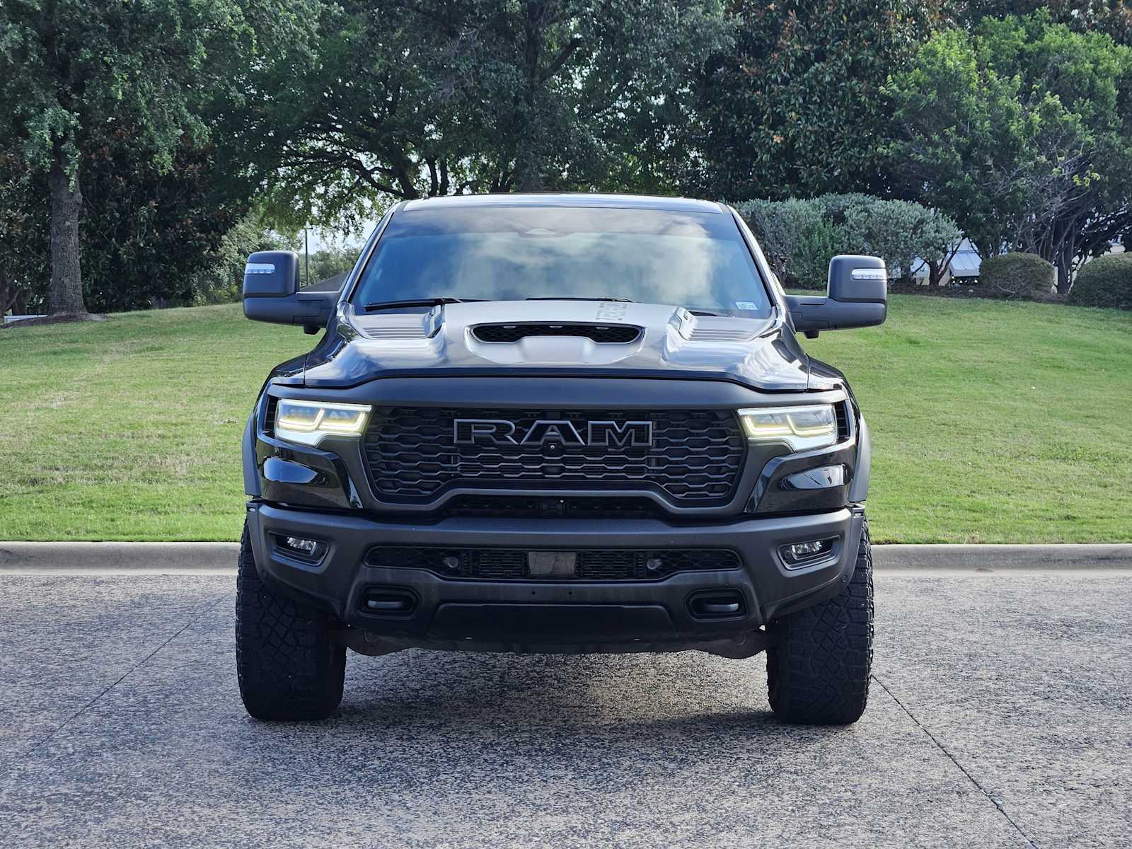 Used 2025 Diamond Black Crystal Pearlcoat Ram RHO image 2