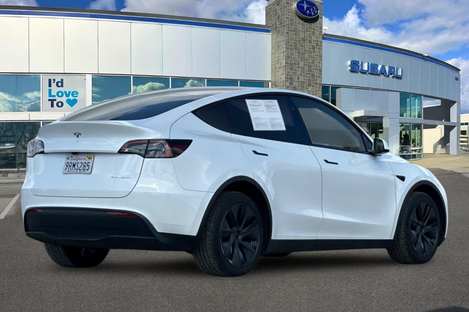 Used 2025 Tesla Model Y Long Range with VIN 7SAYGDEE1SF260814 for sale in Elk Grove, CA
