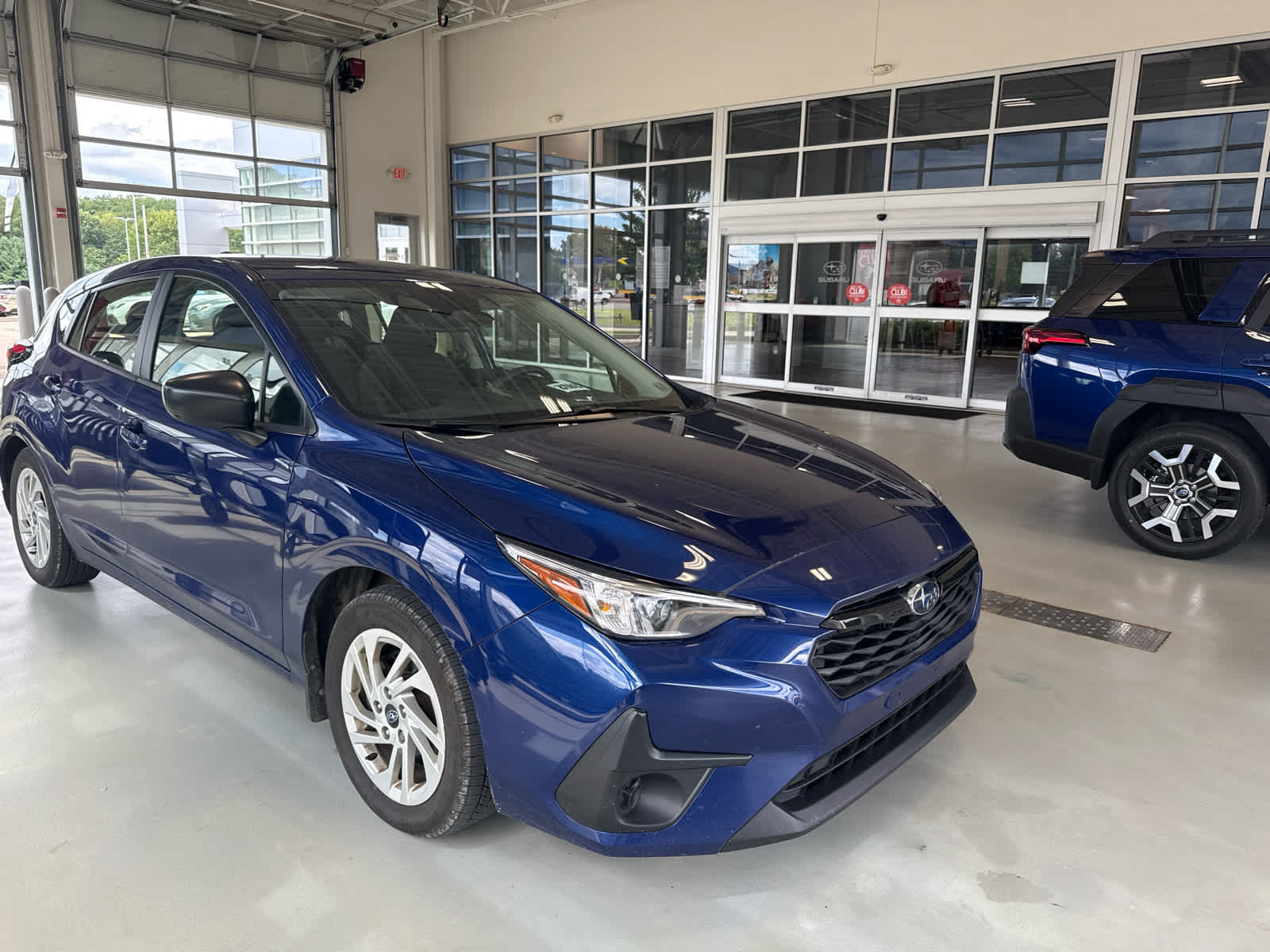 Sapphire Blue Pearl 2024 Subaru Impreza Sedan Continuously Variable Transmission