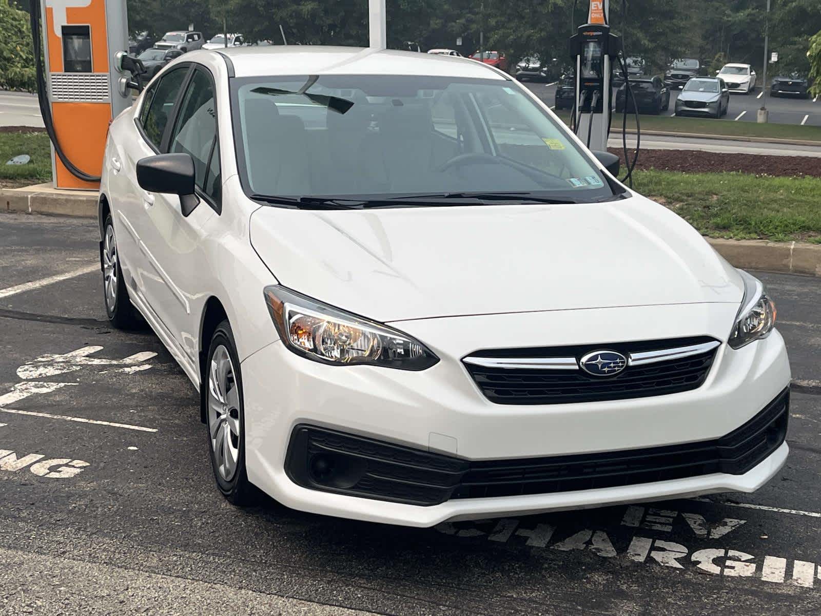 Crystal White Pearl 2023 Subaru Impreza Sedan All-Wheel Drive Continuously Variable Transmission