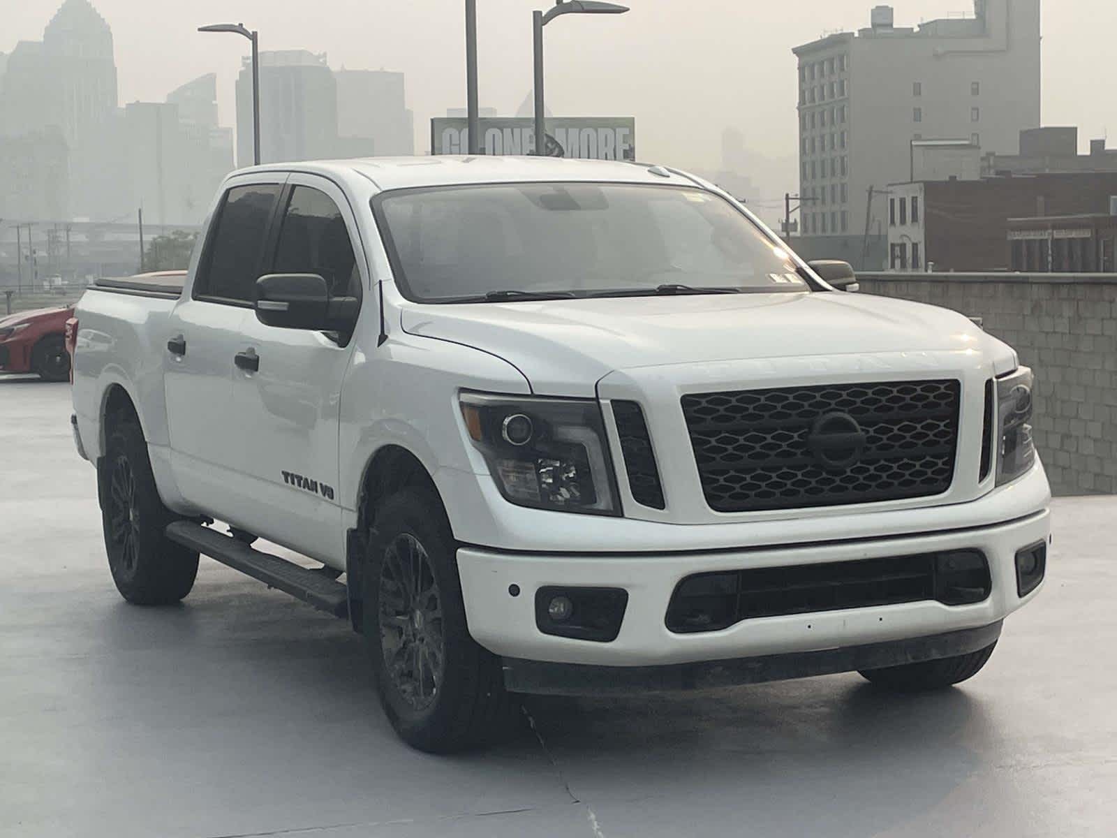 Pearl White 2019 Nissan Titan Pickup Truck Four-Wheel Drive 7-Speed Automatic