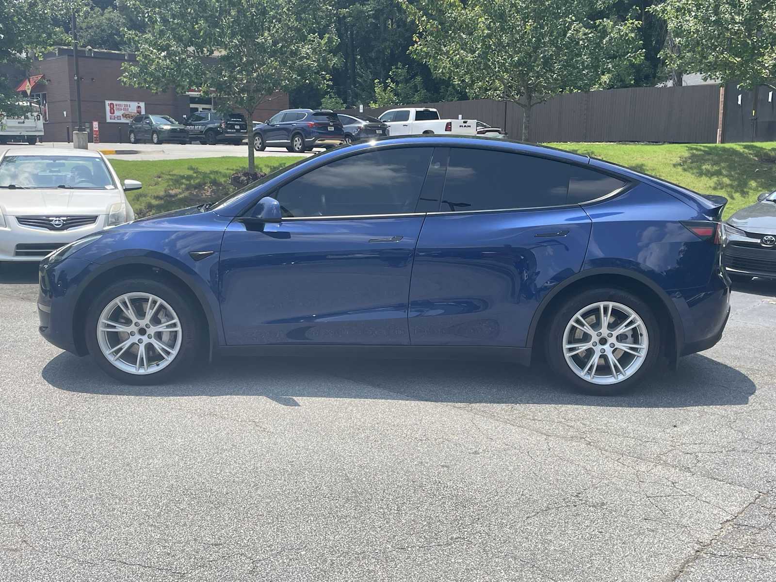 Used 2023 Tesla Model Y Base with VIN 7SAYGDED7PF923477 for sale in Decatur, GA