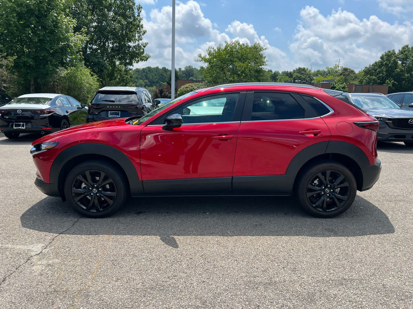 2024 Mazda CX-30 2.5 S Select Sport Soul Red Crystal Metallic at Cochran Mazda