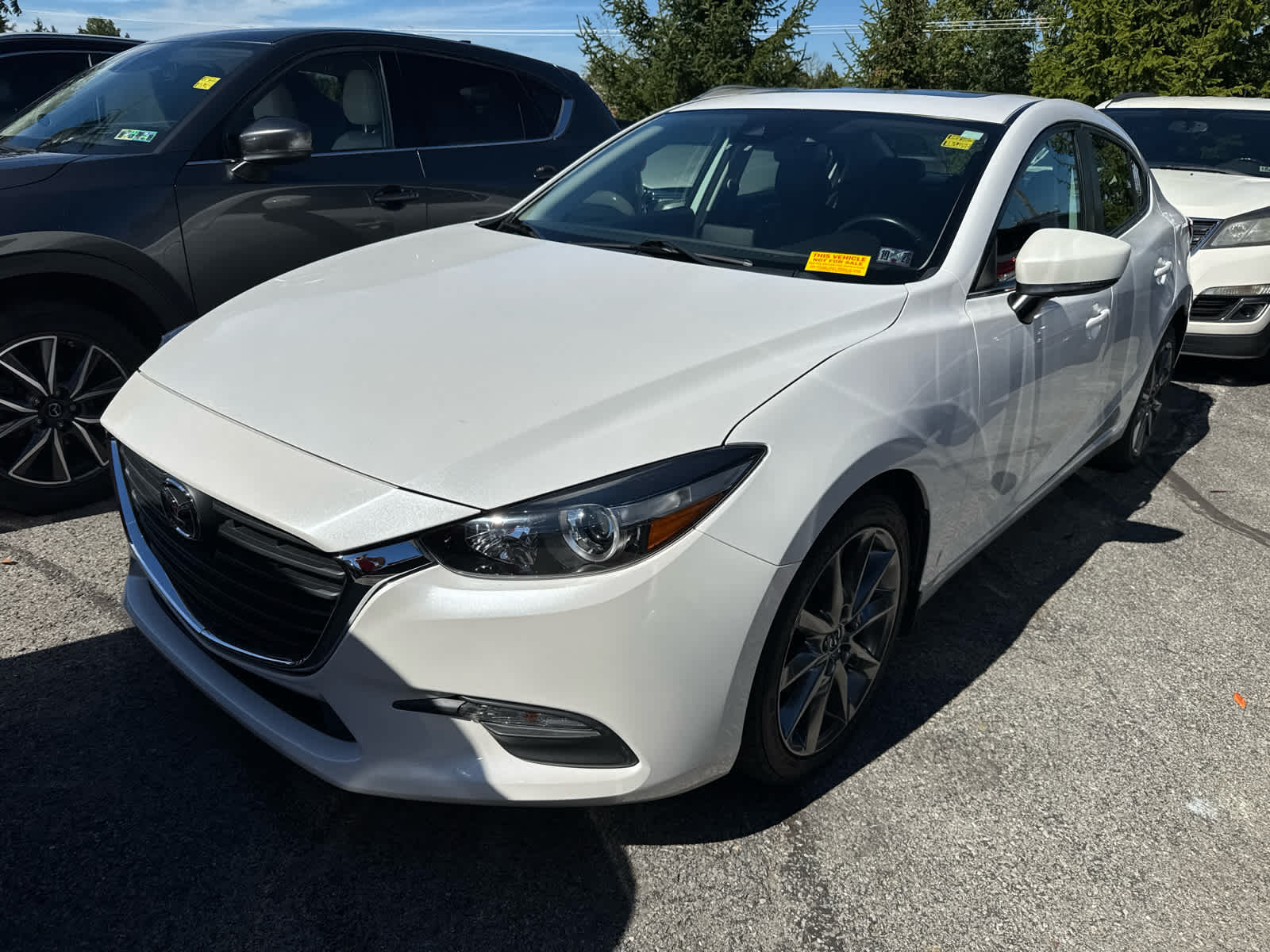 2018 Mazda Mazda3 4-Door Touring Snowflake White Pearl Mica at Diehl Automotive