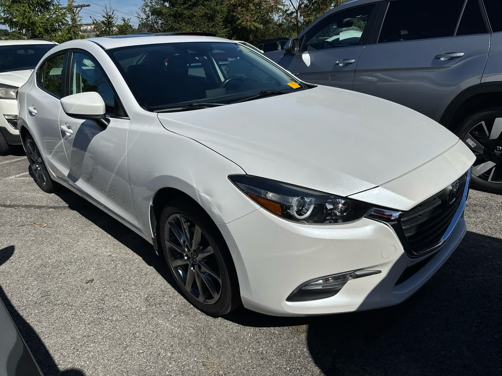 2018 Mazda Mazda3 4-Door Touring Snowflake White Pearl Mica at Diehl Automotive