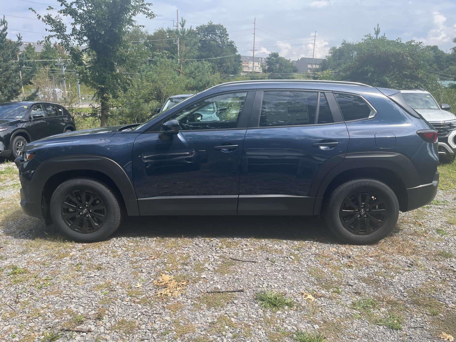 2026 Mazda CX-50 Hybrid Preferred Ingot Blue Metallic at Cochran Mazda