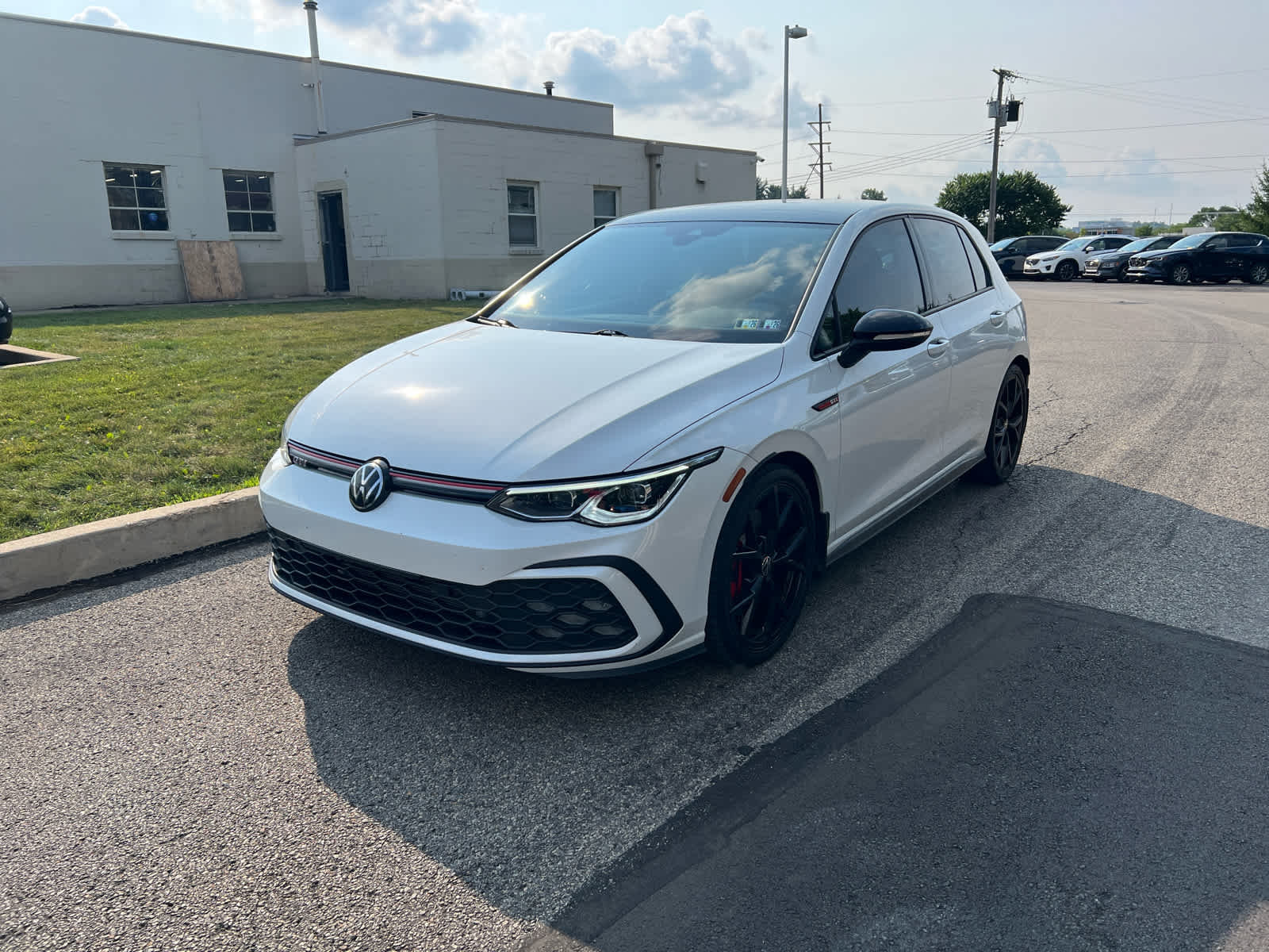 2024 Volkswagen Golf GTI 380 SE Opal White Pearl w/ Black Roof at Cochran Mazda