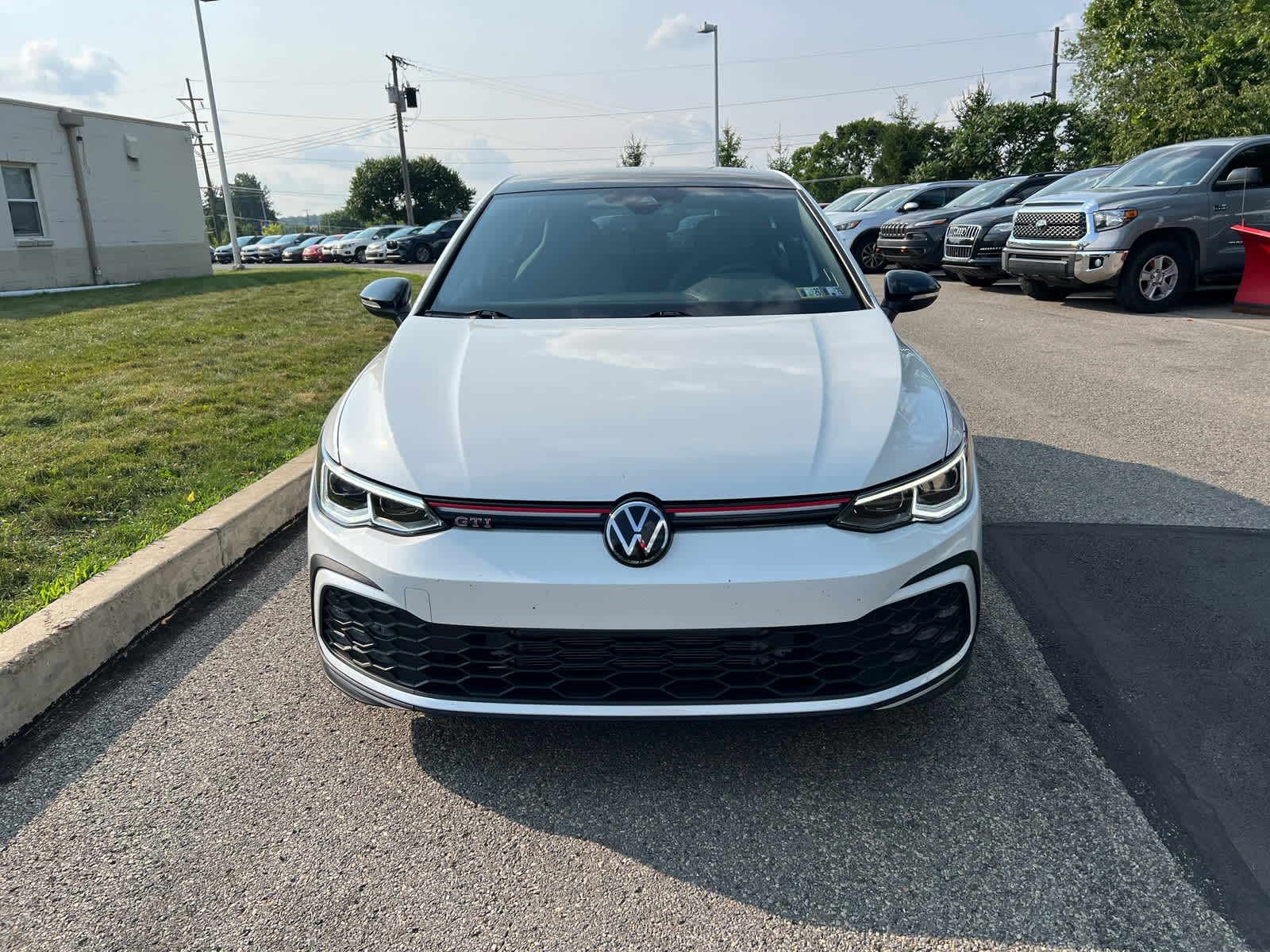 2024 Volkswagen Golf GTI 380 SE Opal White Pearl w/ Black Roof at Cochran Mazda
