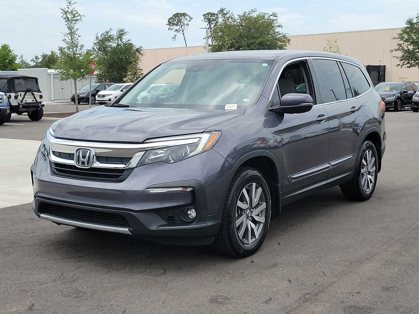 View vehicle photo 3