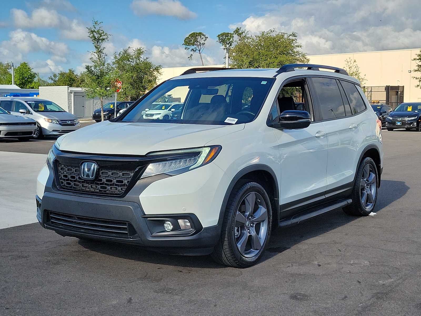 View vehicle photo 3