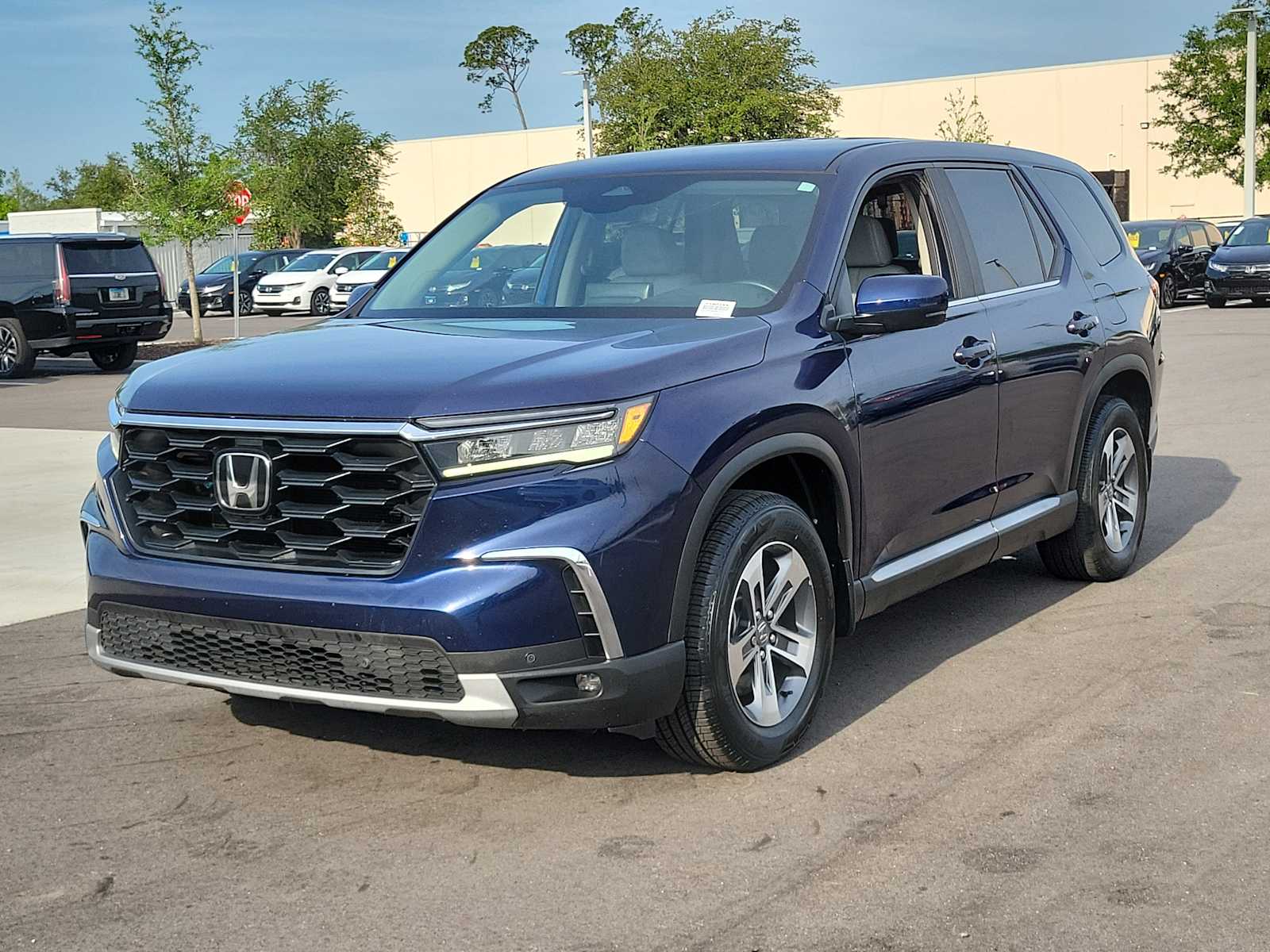 View vehicle photo 3