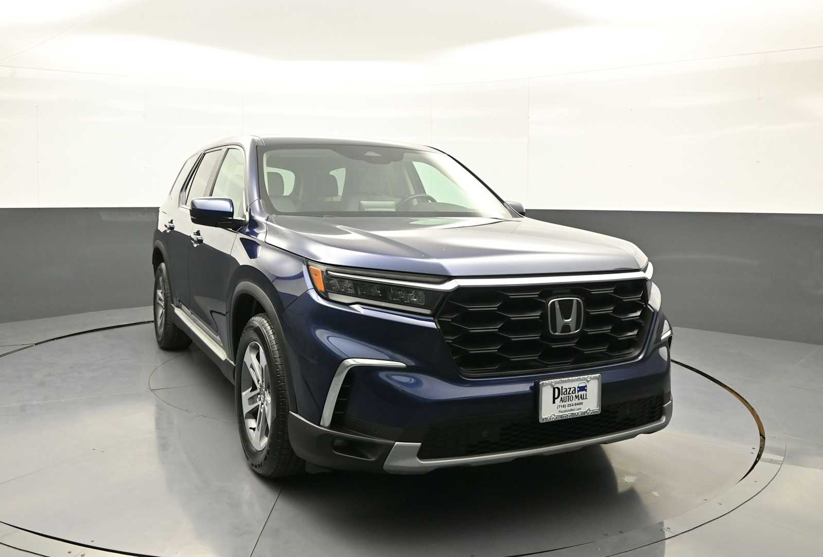 View vehicle photo 3