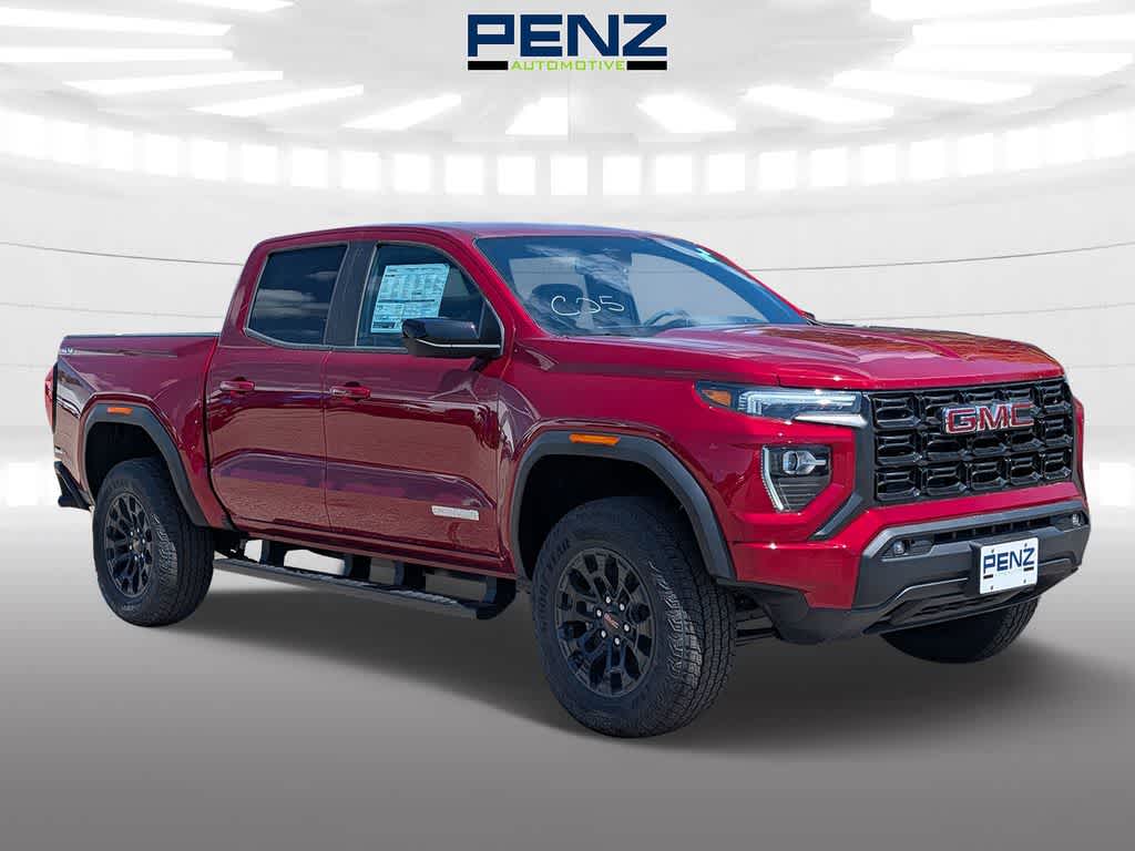Volcanic Red Tintcoat 2026 GMC Canyon Pickup Truck Four-Wheel Drive 8-Speed Automatic