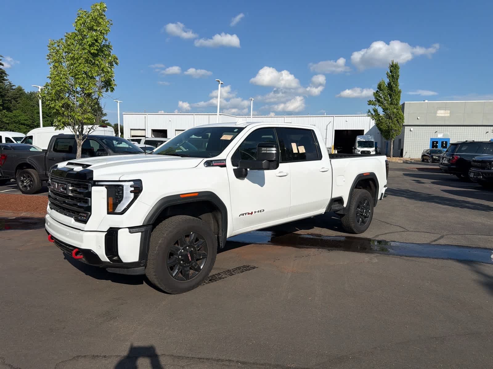 Summit White 2025 GMC Sierra 2500HD AT4 Crew Cab 4WD Pickup Truck Four-Wheel Drive Automatic
