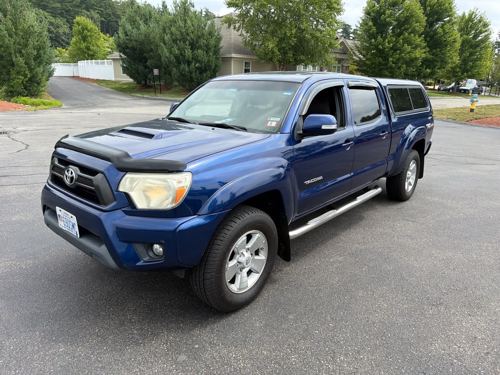 Blue Ribbon Metallic 2014 Toyota Tacoma Pickup Truck Four-Wheel Drive 5-Speed Automatic