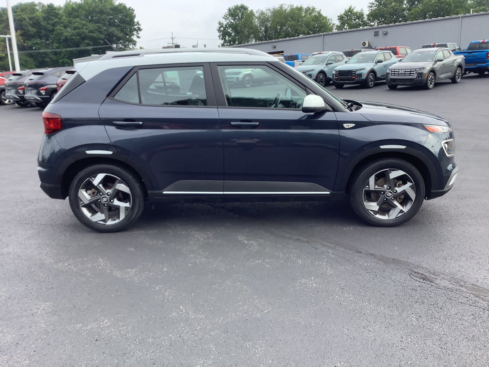View vehicle photo 3