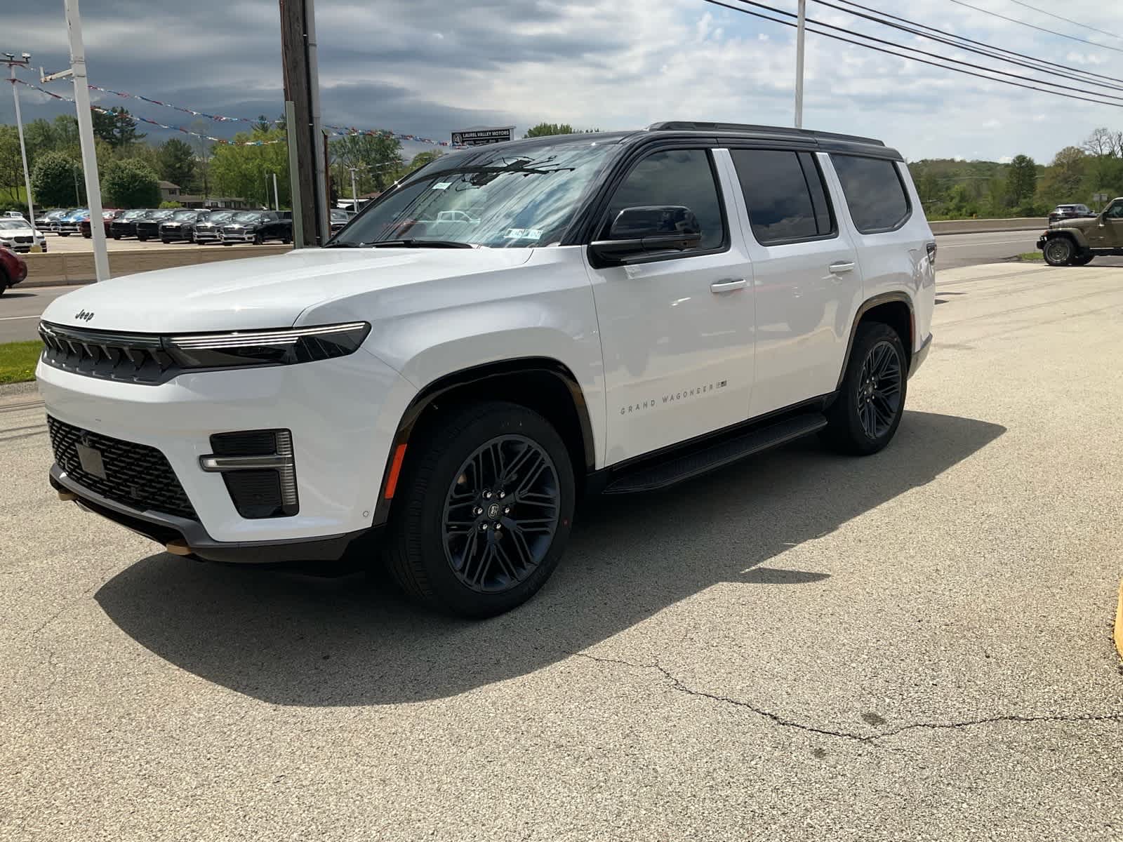 View vehicle photo 3