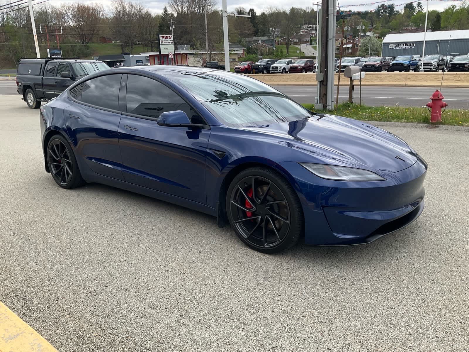 View vehicle photo 3