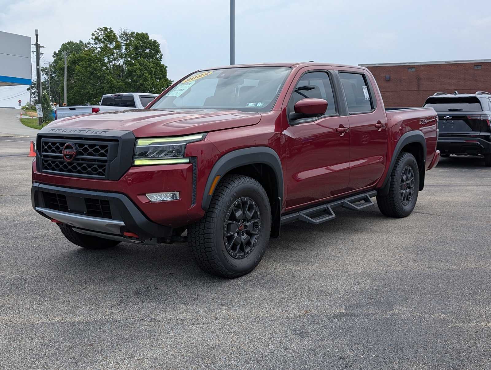 Cardinal Red Tricoat 2022 Nissan Frontier Pickup Truck Four-Wheel Drive 9-Speed Automatic