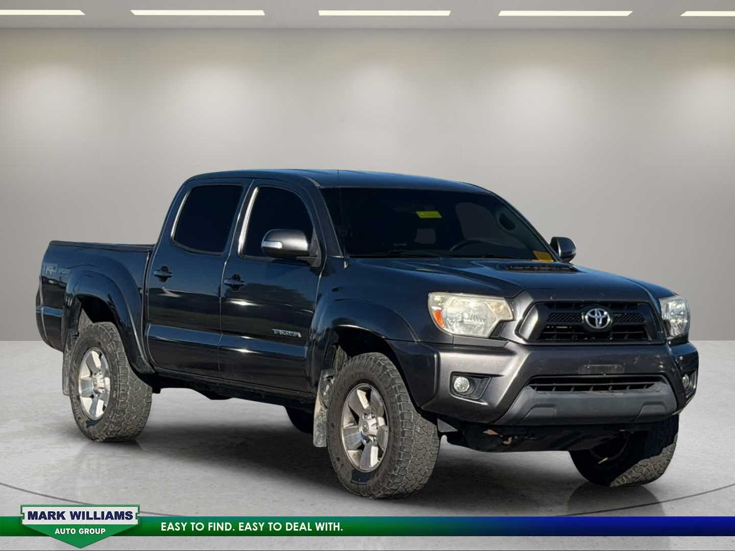 Magnetic Gray Metallic 2015 Toyota Tacoma Pickup Truck Four-Wheel Drive 6-Speed Manual