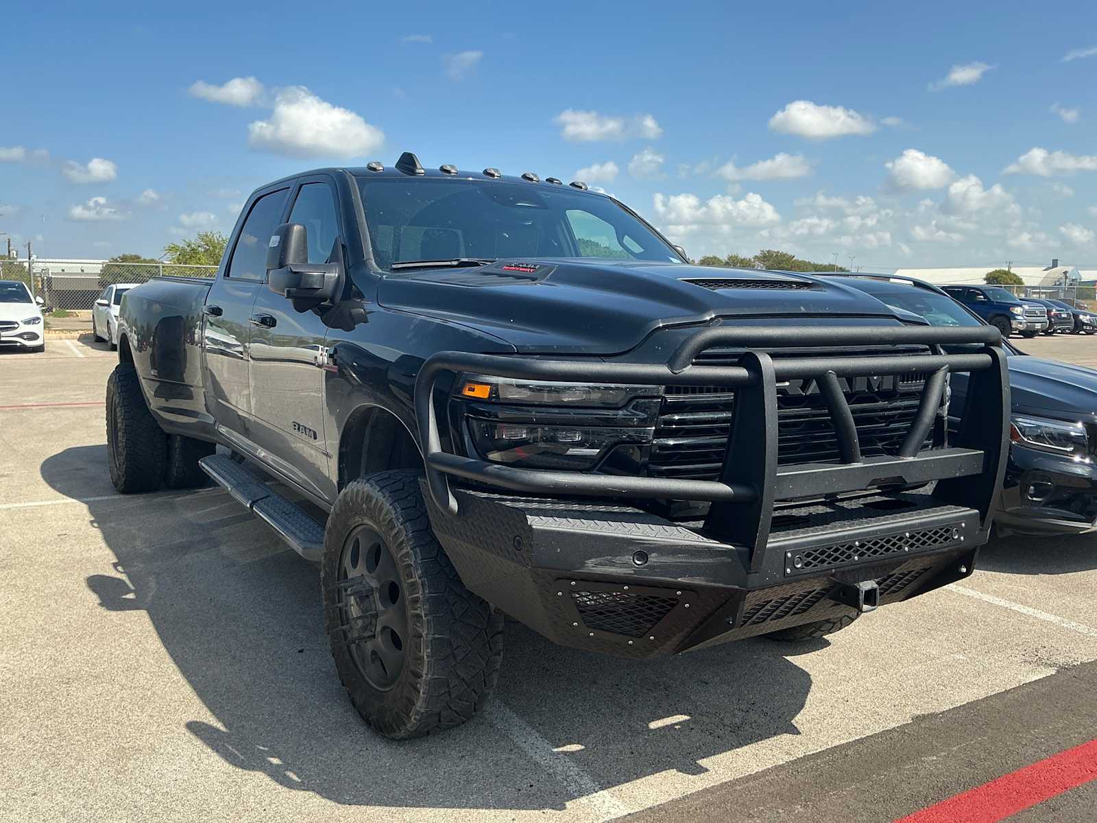 Used 2025 Diamond Black Crystal Pearlcoat Ram Laramie image 2
