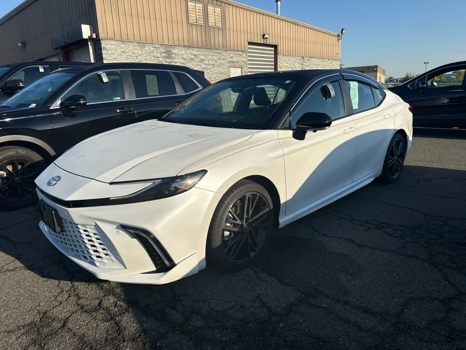Wind Chill Pearl w/Midnight Black Metallic Roof 2026 Toyota Camry Sedan All-Wheel Drive Continuously Variable Transmission