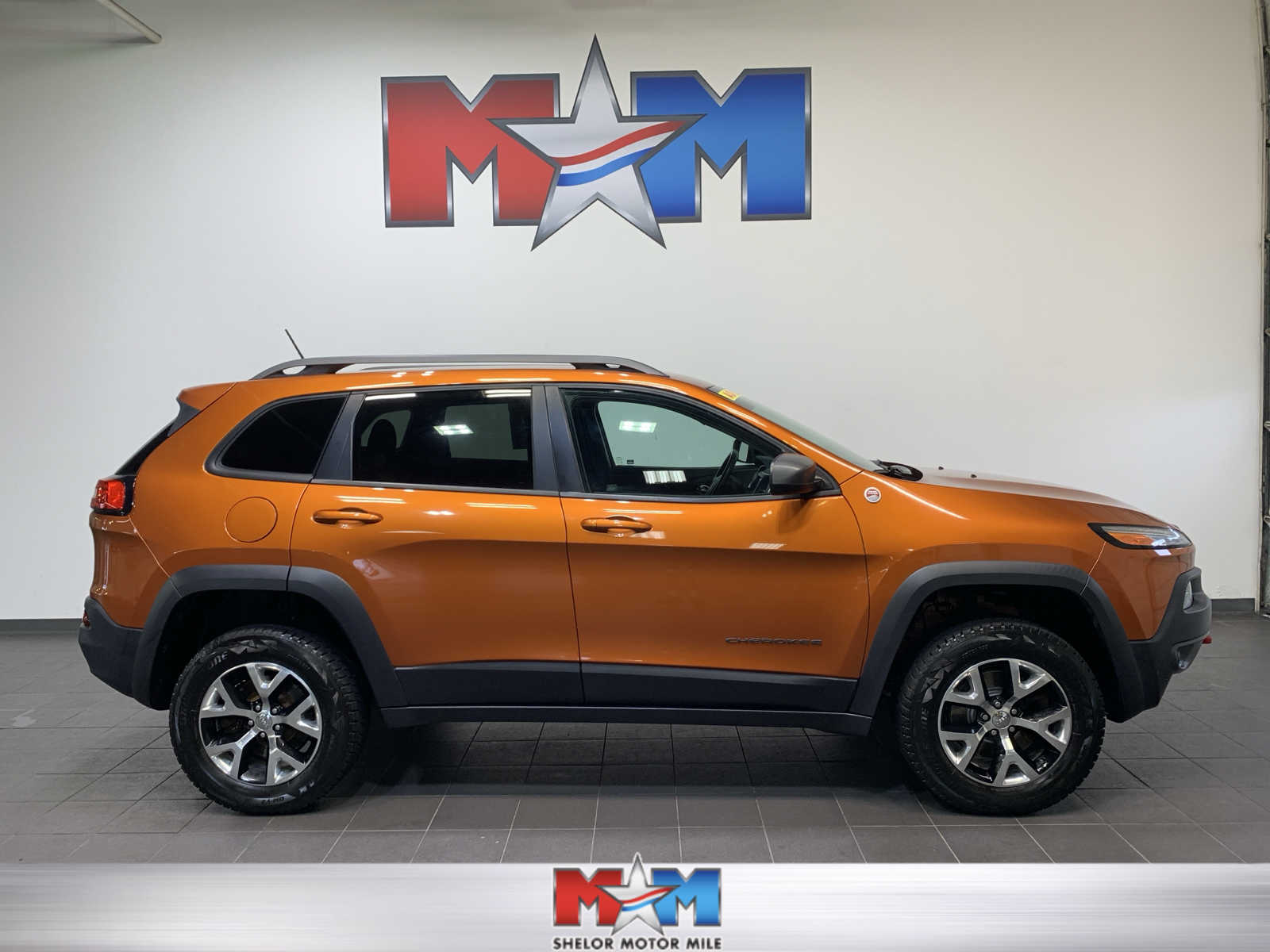 used 2015 Jeep Cherokee car, priced at $15,985