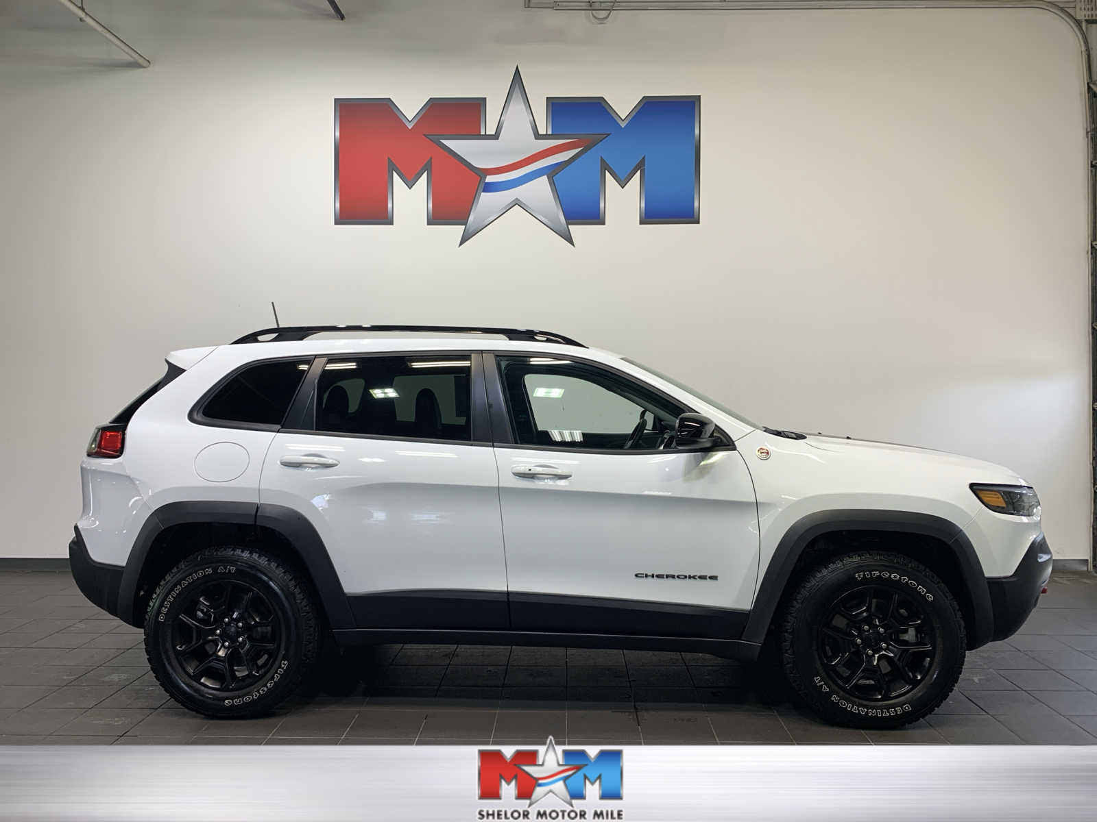 used 2022 Jeep Cherokee car, priced at $35,489